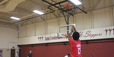 basketball player taking a shot
