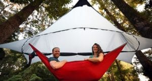 Rhett and his wife, Juli, relax in one of SMr's hammocks.