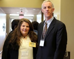 Emilee Ware of Raymond, left, a member of Hinds Community College’s Student VOICES group, state Sen. David Blount of Jackson
