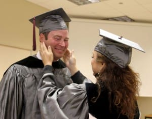 Justin Kuykendall of Pearl, left, and Donna Harris of Raymond, right, graduated from Hinds Community College on Dec. 18 with Associate Degrees in Nursing.