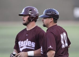 No. 40 volunteer baseball coach Tim Axton of Brandon with Hinds Community College baseball player Marshall Boggs at the spring 2014 College World Series in Enid, Okla.