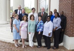 The Hinds Community College Board of Trustees honored new Hinds Heroes at the April 1 board meeting. They are, from left, Cathie Newton, Paula Wimbish, Kathy Nelson, Cheryl Bozeman, Tabitha Watts, Tiffany Gaskin; second row, Keri Cole, Randy Minton, Sam Lemonis, board president Dr. Lynn Weathersby, Eric Neal, Lee Cooper; back row, Hinds President Dr. Clyde Muse, Daryl Tate.