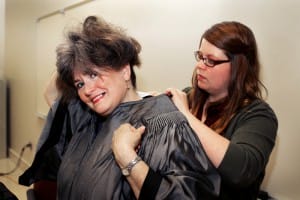 Cynthia Hollingsworth, left, gets help adjusting her gown from Haley Hartfield before commencement exercises at Cain-Cochran Hall May 15. Hollingsworth, of Florence, earned an Associate’s of Arts and plans to pursue a nursing degree from Belhaven.