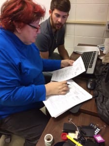English Department chair Lisa Morgan assists sophomore Taylor Pace is his class selection and registration for the spring 2016 semester.