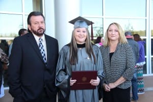 Breana Grimsley of Morton received a degree in dental assisting from Hinds Community College on Dec. 18. With her are her parents, Chris and Joanne Grimsley