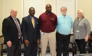 Celebrating with MI-BEST student Allen Warner, center, are, from left, Hinds Community College Vicksburg Dean Marvin Moak, Warren County Supervisor Charles Selmon, CMPDD administrator Charles McGuffee and Hinds Vicksburg Adult Education and GED navigator Lauren Powers.