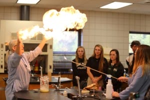 Hinds Community College Rankin Campus chemistry instructor Lou Ann Williams and Hinds sophomore Lindsey Bowen use soap bubbles, methane gas and fire for an impressive science demonstration.