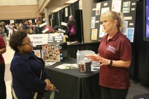 Clinton Christian Academy junior Charsity Ammons of Byram spent some time exploring the Marketing Management Technology booth with the help of Rankin Campus chair Jane Foreman. She plans to start her college career at Hinds and then “I’ll probably go to a four-year college.”