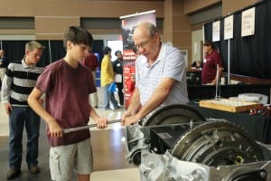 Jimmy Flint of Empire Trucking showed Pisgah eighth-grader Jack Guy a thing or two about engines at Hinds Community College’s Career Exploration Day on Nov. 8 at the Rankin Campus. Empire along with Stribling Equipment and Baptist Health Services sponsored the event.