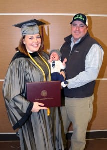 Niccole Landrum of Madison graduated on Dec. 16 with a certificate in Practical Nursing. With her are husband Wyatt and one-month-old son Parker.