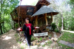 Gloria Patrick Lucas, in front of the house her uncle built and she purchased in 2015
