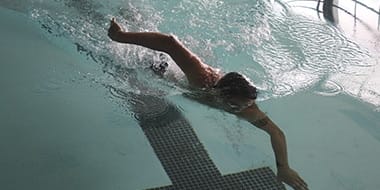 guy swimming in pool